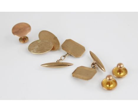 A pair of 9ct gold cufflinks, each designed as a rectangular panel with canted corners and engine turned detail, 16mm x 11mm,