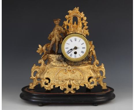 A late 19th century French gilt spelter mantel timepiece, the 8cm white enamelled dial enclosing the single train movement, t