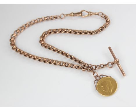 A Victorian 9ct gold watch chain, comprising alternating curb links and faceted ring links, with attached T-bar and gold colo