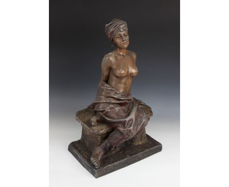 After Emmanuel Villanis (French, 1858-1914), an Art Nouveau orientalist cold painted spelter figure, modelled as a shackled s