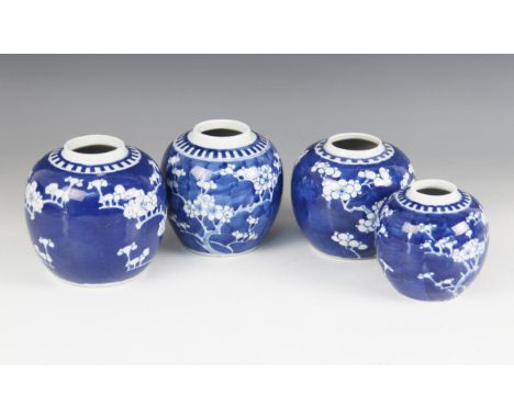 Four assorted Chinese porcelain blue and white ginger jars, predominantly 19th century, each decorated with an all over prunu