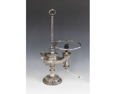 A 19th century German brass oil lamp by Wild and Wessel, Berlin, converted to electricity, modelled as a Roman lamp with bras