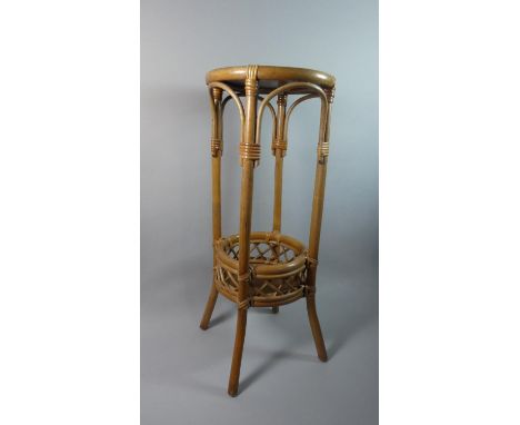 A Circular Bamboo Jardiniere Stand with Stretcher Shelf, 75cm High 