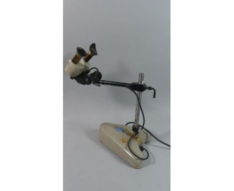 A Vintage Binocular Microscope by C Baker, London 