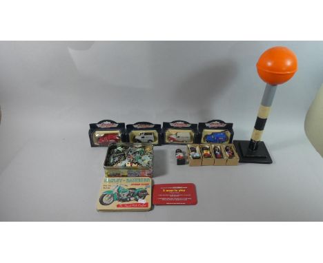 A Collection of Five Robertson Golly Band Figures, Diecast Toys, Harley Davidson Puzzle and a Toy Belisha Beacon 