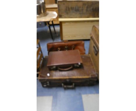 A Vintage Leather Suitcase, Leather Briefcase, and Small Case 