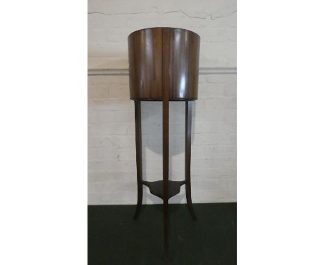 An Edwardian Cylindrical Mahogany Plant Stand on Tripod Support with Stretcher Shelf, Original Metal Liner (AF), 96cm High 