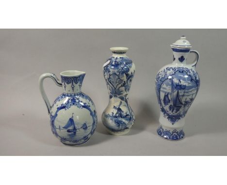 A Joost, Thooft and Labouchere Delft Jug and Delft Vase Together with a Blue and White Lambeth James Burrough Lidded Whisky F