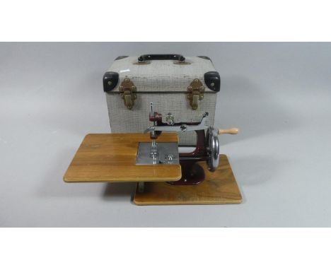 A Vintage Sewing Machine in Carrying Case 