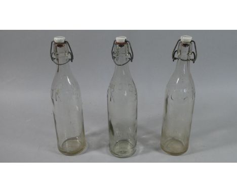 A Collection of Three Vintage Corona Glass Lemonade Bottles, Each 32cm high 