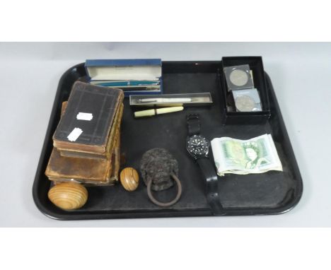 A Tray Containing Various Coins, Vintage £1 and 10 Shilling Bank Notes, Pens, Lion Mask Door Knocker, Books etc 