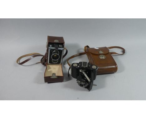 A Vintage Super Ikonta Camera in Unrelated Leather Case Together with a Zeiss Ikon Box-Tengor Camera in Leather Carrying Case