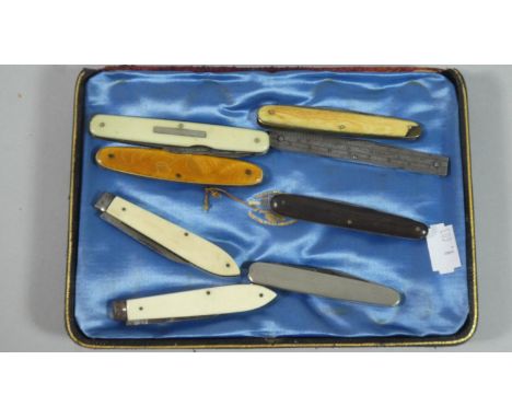 A Collection of Eight Vintage Penknives One with Etched Ruler Scale by Ratner Safes 