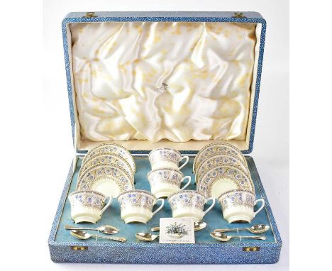 ROYAL WORCESTER; a cased set of six cabinet cups and saucers, in 'Lady Evelyn' Pattern, with six plated teaspoons, set dated 