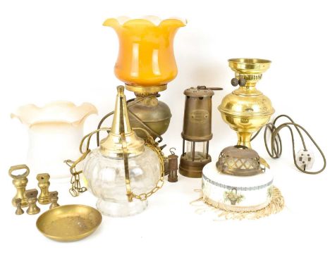 Various lighting to include two brass paraffin lamps converted to electricity, with vintage glass shades, height of tallest 4