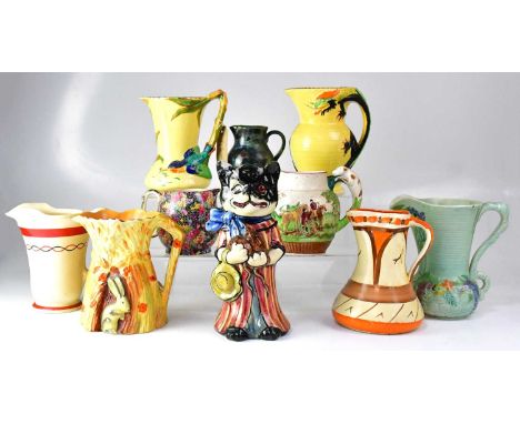 A quantity of decorative jugs including a Royal Winton Grimwades example in the 'Hazel' pattern, Burleigh Ware, Myott, Son &a