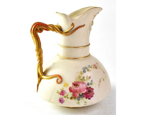 ROYAL WORCESTER; a blush ware jug of squat form with gilt wrythen handle, shape no. 1378, puce mark date 1891, height 17cm.Co