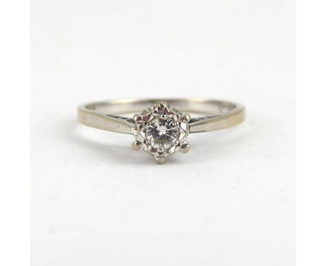 An 18ct white gold solitaire ring claw set with a 0.1ct brilliant diamond, size K, approx. 2g.