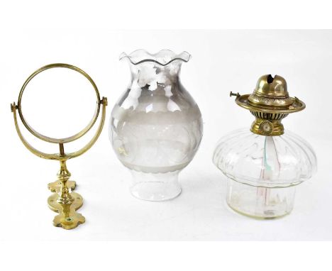 A late 19th/early 20th century ship's wall-mounted oil lamp, with 'Improved Anucapnio Brass Burner', wall-mounted brass gimba