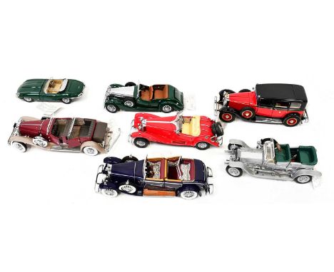 FRANKLIN MINT PRECISION MODELS; seven boxed display model cars comprising Rolls-Royce Silver Ghost, Jaguar E Type, The Merced