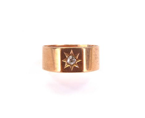 A gentlemen's 9ct rose gold wide band ring with flat top inset with tiny diamond, size V, approx. 5.9g.