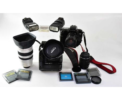 A DSLR Canon EOS 5D with additional BG-E4 battery and EF 24-105mm lens, and a Canon EOS 5 film camera, a Canon video lens 20x