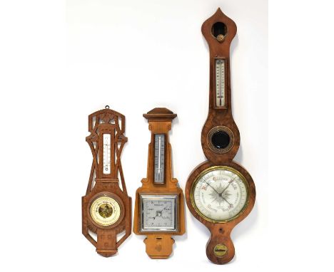 An early 20th century burr walnut five-dial barometer/thermometer with white enamelled dial, length 95cm (af), a small Art De