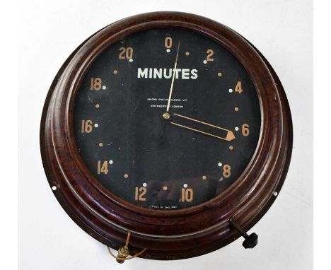 SMITHS; a vintage Bakelite wall-mounted alarm clock, the black dial inscribed 'Minutes' in white lettering and further inscri