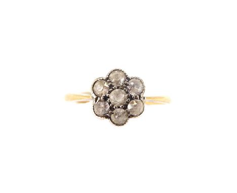 An 18ct gold white stone flower head cluster ring, size N, approx. 2.1g.Condition Report: Not diamonds