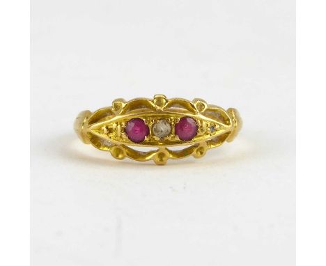 An 18ct gold Victorian-style ring set with two rubies separated with three tiny diamonds, size J, approx. 1.6g (af).Condition