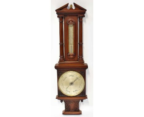 A substantial Victorian mahogany barometer/thermometer with 10" silvered dial below thermometer, flanked by reeded pilasters,