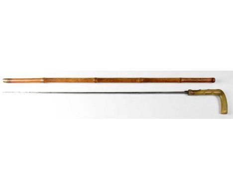 A late 19th/early 20th century bamboo horn-handled sword stick with yellow base metal collar, acid etched decoration to the b