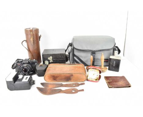 A collectors' lot to include two African tribal spoons, possibly Lega spoons, a hip flask, travel flask, leather wallet, a Ba