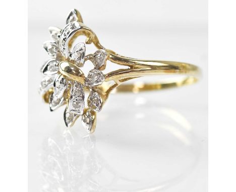A 9ct gold ring set with small diamonds in foliate style, stamped 375, size Q, approx. 2.4g.