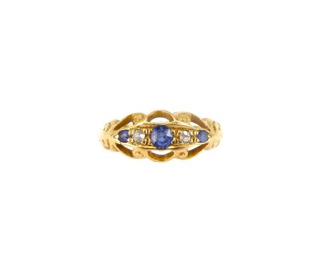 An 18ct gold Victorian-style ring set with sapphires and tiny diamonds, size N, approx. 3.2g.