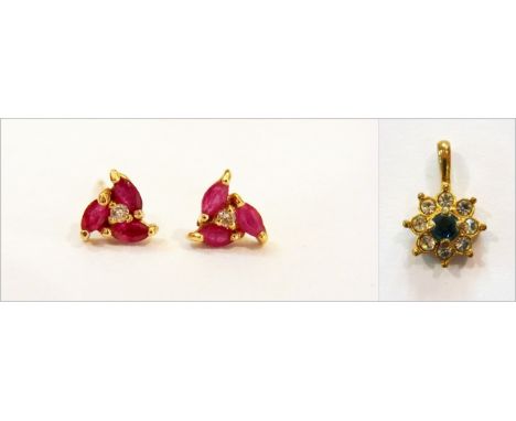 Pair 14K gold ruby and diamond earrings, each set centre tiny diamond surrounded by three rubies and a blue and white stone c