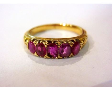 Gold and ruby five-stone ring 