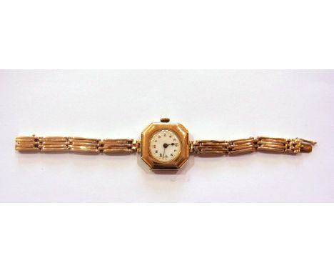 Lady's 15ct gold wristwatch, the octagonal face on expanding 15ct gold three-bar gate style bracelet 