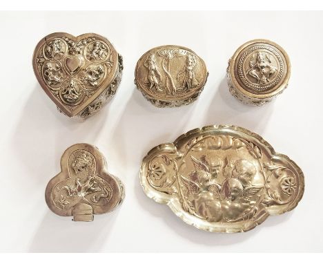 Four Indian white metal trinket boxes, various together with a small white metal trinket tray, cherub pattern 