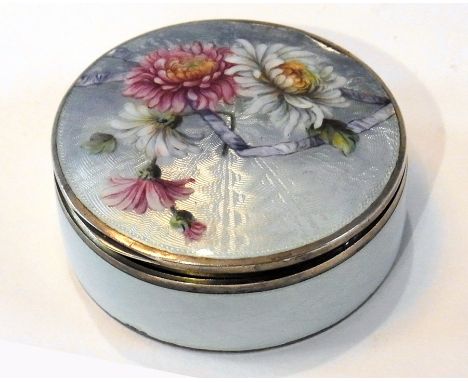 A .925 silver and enamel circular box with floral design cover and import mark for 1911, 6cm diameter 