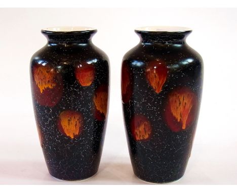 Pair Poole pottery vases in shouldered ovoid shape, abstract dotted design on a black marble-effect ground, 8cm diameter 