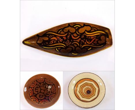 A Poole Aegean spear formed dish decorated in an abstract pattern, on a dappled brown and gold ground, 18cm diameter, a Poole