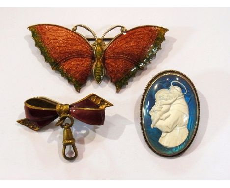 Small butterfly brooch, enamel bow brooch suspension and butterfly winged St Christopher brooch (3) 