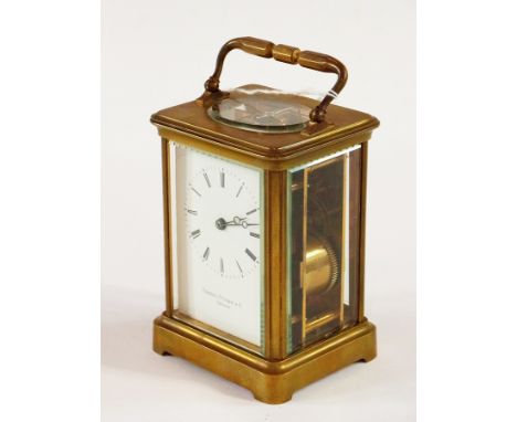 French brass striking carriage clock, back plate marks Hy Marc, Paris, the white enamel dial bearing retailers name, Charles 
