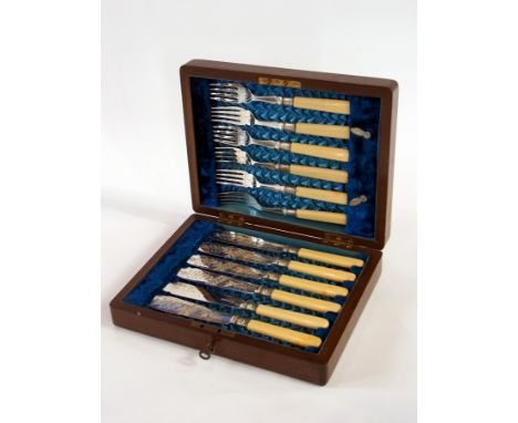 A silver plate fish knife and fork set with silver hilts and ivorine handles, cased (12) 