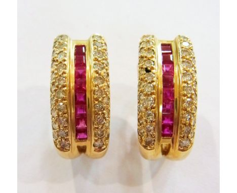 14K gold diamond and ruby suite viz:- ring, the centre band of square cut rubies flanked by half hoops of diamonds and the pa