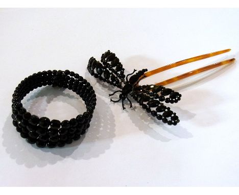 French jet and simulated tortoiseshell hair comb in the form of a flying insect and a French jet bangle (2) 
