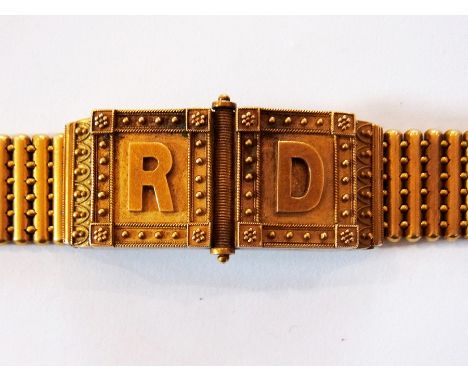 Victorian gold-coloured metal locket bracelet having pair hinged flaps embossed "R" and "D" revealing portrait miniatures, al