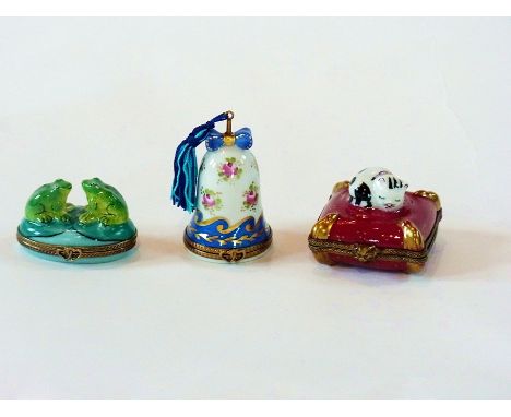 Three various 20th century Limoges porcelain trinket boxes in the form of a bell, a cat and a pair of frogs (3) 