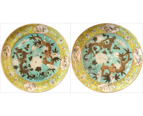 Pair of late 19th century Chinese porcelain plates, the yellow enamelled border with floral scroll decoration interspersed wi